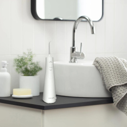 Ирригатор Waterpik WF-21 портатив. импульсн. 2насад. белый