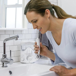 Ирригатор Waterpik WP-160 Ultra Plus импульсн. 7насад. белый
