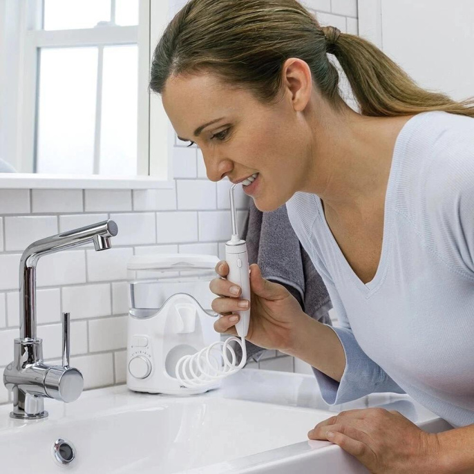Ирригатор Waterpik WP-160 Ultra Plus импульсн. 7насад. белый