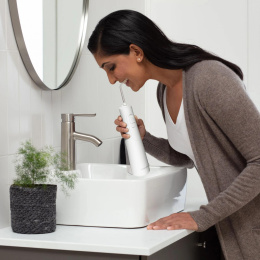 Ирригатор Waterpik WF-21 портатив. импульсн. 2насад. белый