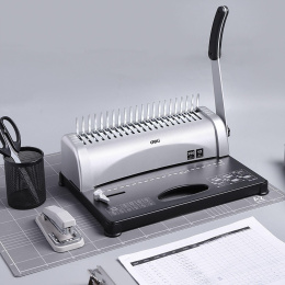 Переплетная машина брошюровщик , кол-во пробиваемых листов 12, объем переплета 350 л.,21 отверстие