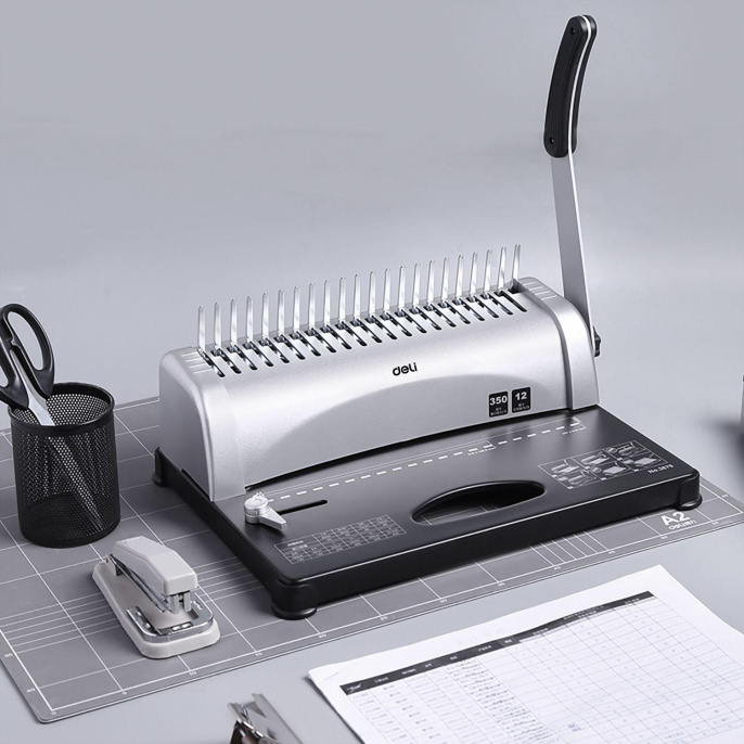 Переплетная машина брошюровщик , кол-во пробиваемых листов 12, объем переплета 350 л.,21 отверстие