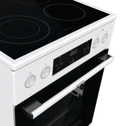 Плита Gorenje GECS5C60WPA, полезный объем 70 л, эргономичные переключатели, сенсорный программатор IconLED, эмаль SilverMatte, очистка паром, индикатор остаточного тепла для каждой конфорки, телескопические направляющие на 2-х уровнях, дверца CompactDo