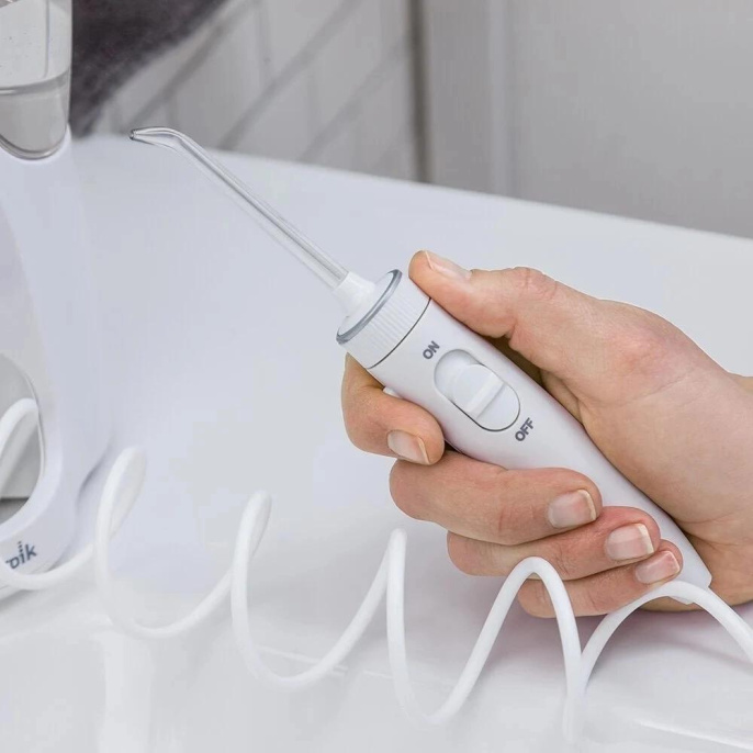 Ирригатор Waterpik WP-160 Ultra Plus импульсн. 7насад. белый